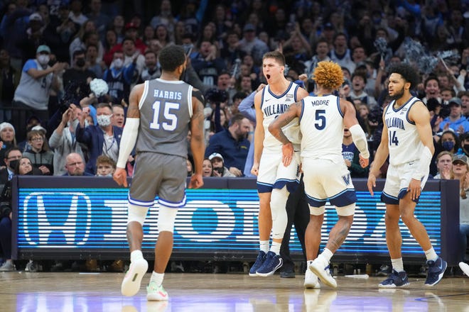 Villanova's Collin Gillespie (2), Justin Moore (5) and Caleb Daniels (14) react in front of Seton Hall's Jamir Harris (15) in the second half Saturday at the Wells Fargo Center.