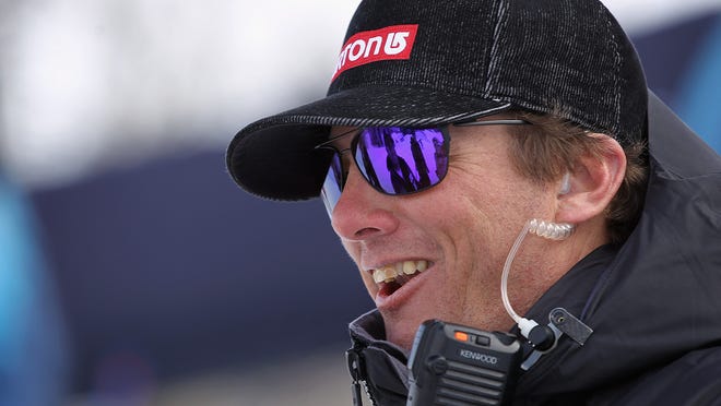 In a file photo from 2010, Peter Foley, then the U.S. Olympic Snowboarding coach, looks on at a World Cup in Colorado. He has left his role at U.S. Snowboarding after being suspended by SafeSport.