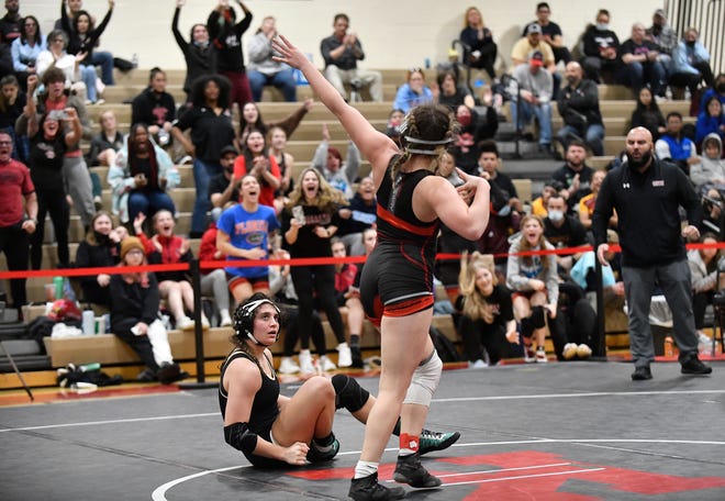 Kingsway's Alexa Firestone pinned Southern's Ella Yanuzzelli during Saturday's 152 lb. bout at the NJSIAA 2022 South Region girls' wrestling tournament held at Kingsway High School. Feb. 12, 2022.