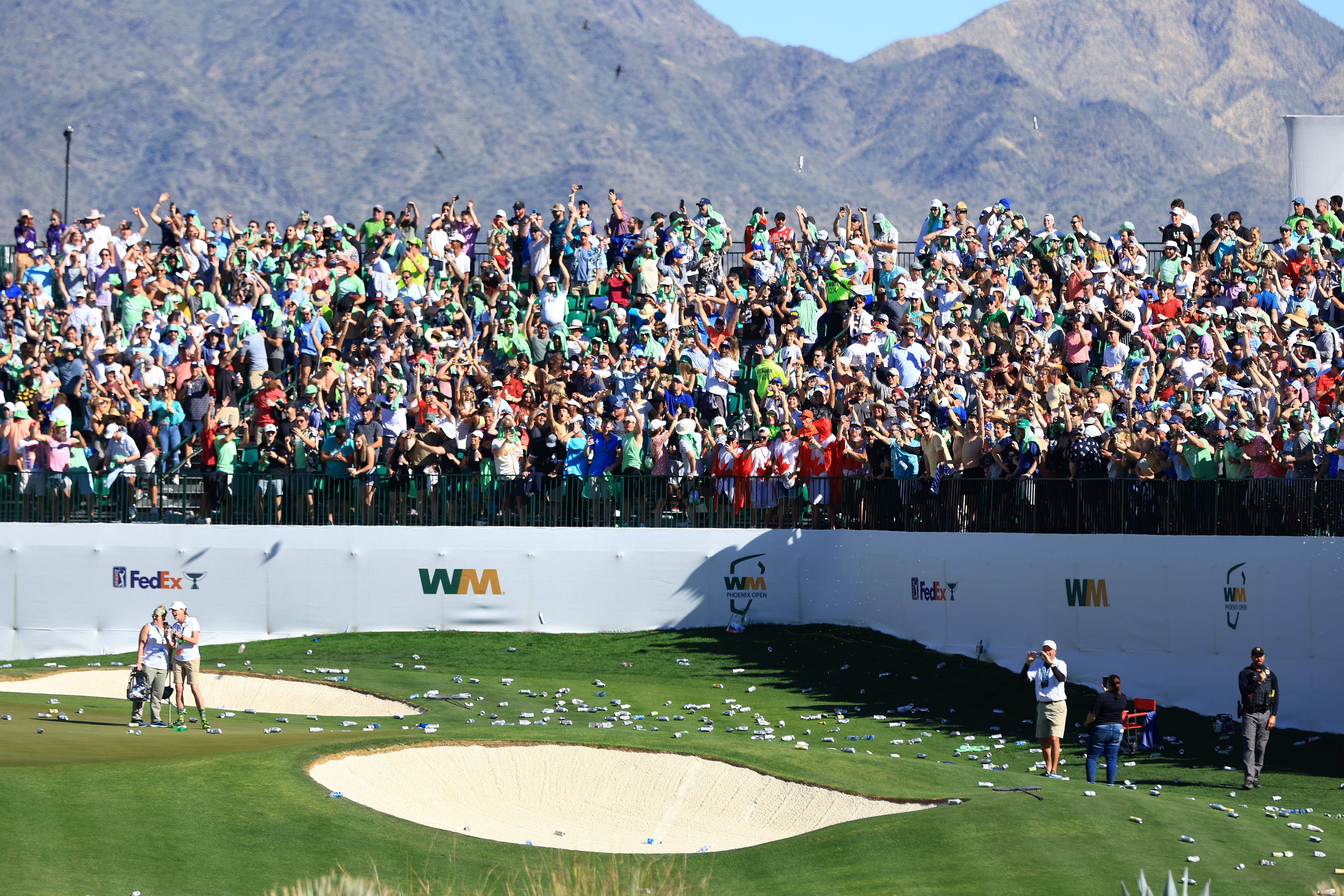 Fans shower 16th hole at Phoenix Open with beer cans after holeinone