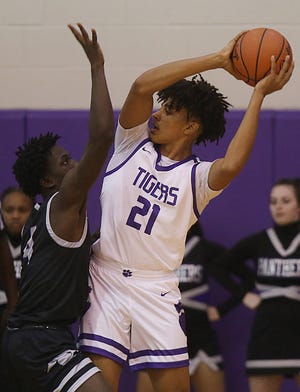 Pickerington North's Jeff Amapps guards Pickerington Central's Devin Royal during their game Dec. 7. Both are among the top players for their teams, which are two of the area's best in Division I.