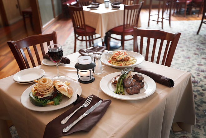 Steak tips with asparagus and potato wedges at Disch's Route 53 Tavern.