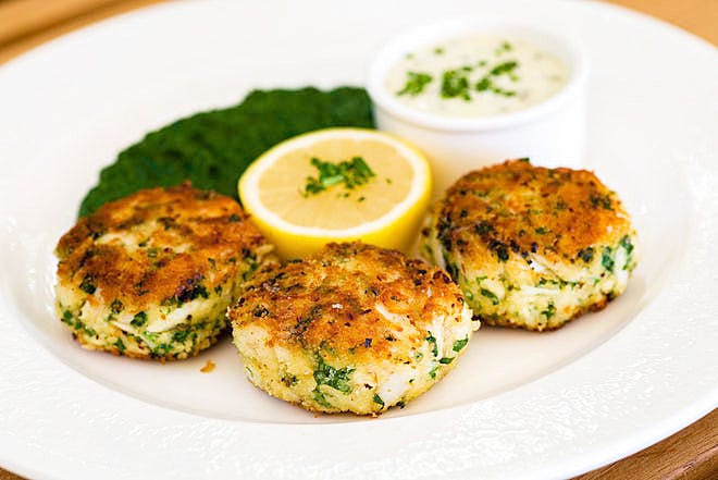 Swifty's popular crab cakes with creamed spinach dish was inspired Mortimer’s, a long-gone New York society bistro.
