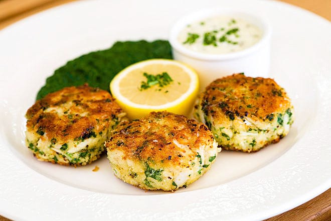 Swifty's popular crab cakes with creamed spinach dish was inspired Mortimer’s, a long-gone New York society bistro.