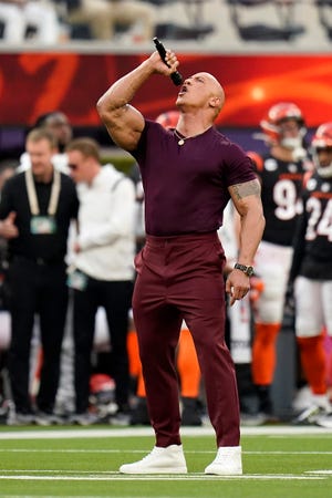 Dwayne “The Rock” Johnson introduces both teams before the first quarter of Super Bowl 56 between the Cincinnati Bengals and the Los Angeles Rams at SoFi Stadium in Inglewood, Calif., on Sunday, Feb. 13, 2022. The Rams came back in the final minutes of the game to win 23-20 on their home field. 