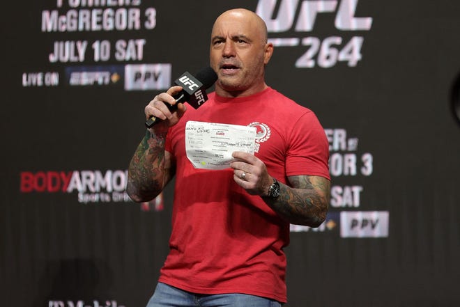 UFC commentator Joe Rogan announces the fighters during a ceremonial weigh in for UFC 264 at T-Mobile Arena on July 9, 2021 in Las Vegas, Nevada. (Stacy Revere/Getty Images/TNS)