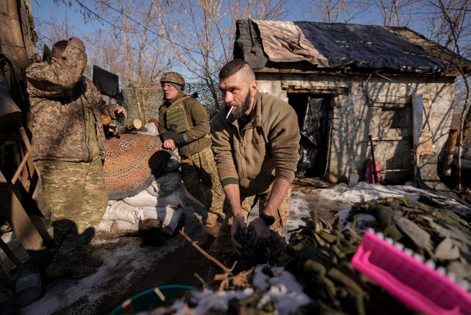 Ukrainian troops at the front line in eastern Ukraine on Feb. 14, 2022.