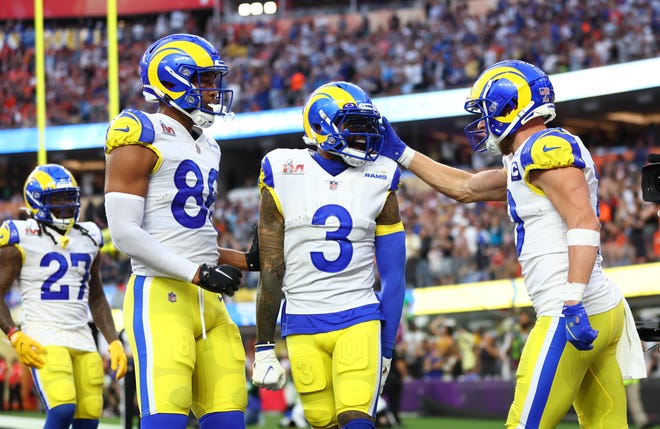 Los Angeles Rams wide receiver Cooper Kupp (right) celebrates with wide receiver Odell Beckham Jr. (3) after catching a touchdown pass against the Cincinnati Bengals during the second quarter in Super Bowl LVI at SoFi Stadium.