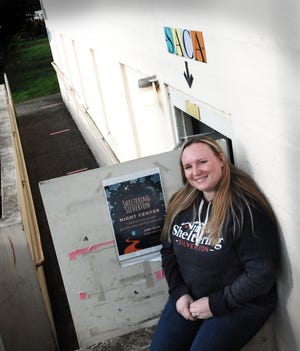 Kayla Burdine-Rea, executive director of Sheltering Silverton, at the doorway to the basement offices of the non-profit —which it shares with the Silverton Area Community Aid offices.