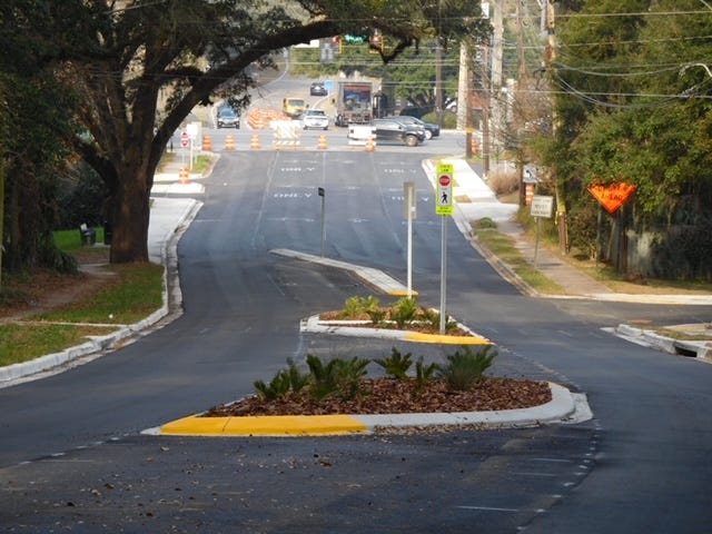 Vehicle/pedestrian safety improvements include slimmed travel lanes, intermittent raised medians and improved sidewalks.