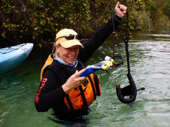 SpringsWatch volunteer Joan Landis on the Weeki Wachee River.
