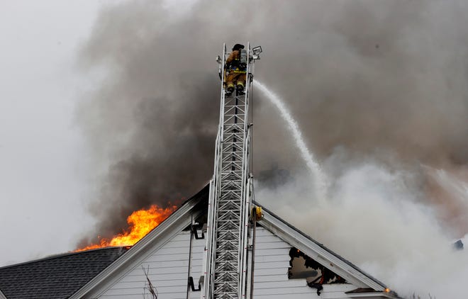 Oakland Hills Country Club in Bloomfield Township caught fire early morning on Feb. 17, 2022. Several fire departments from surrounding cities battled the fire which was quickly spreading throughout the building.