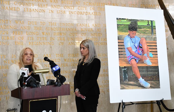 Lebanon County District Attorney Pier Hess Graf stands with Jason Rivera's grandmother Thursday morning as she talks about the death of her 13-year-old nephew. "There's never words to say how we feel, but I do want to say that if anyone knows anything please, whatever the thing you think it might be ... please say something," his grandmother said.