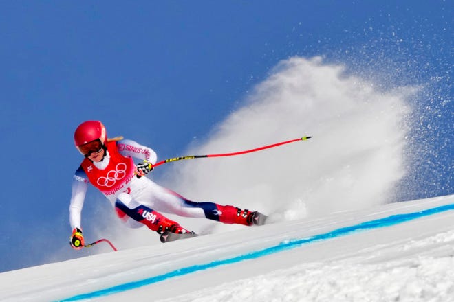 Mikaela  Shiffrin races down the mountain in the downhill portion of the women’s Alpine combined event at the Beijing Olympics.