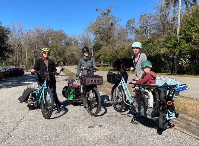 Grace Francis, Marie-Claire Lehman, and Sarah Severs and son Elliot making the most of their ebikes.