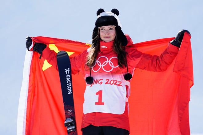 Eileen Gu (CHN)  celebrates the gold medal after competing in the halfpipe final during the Beijing Olympics.