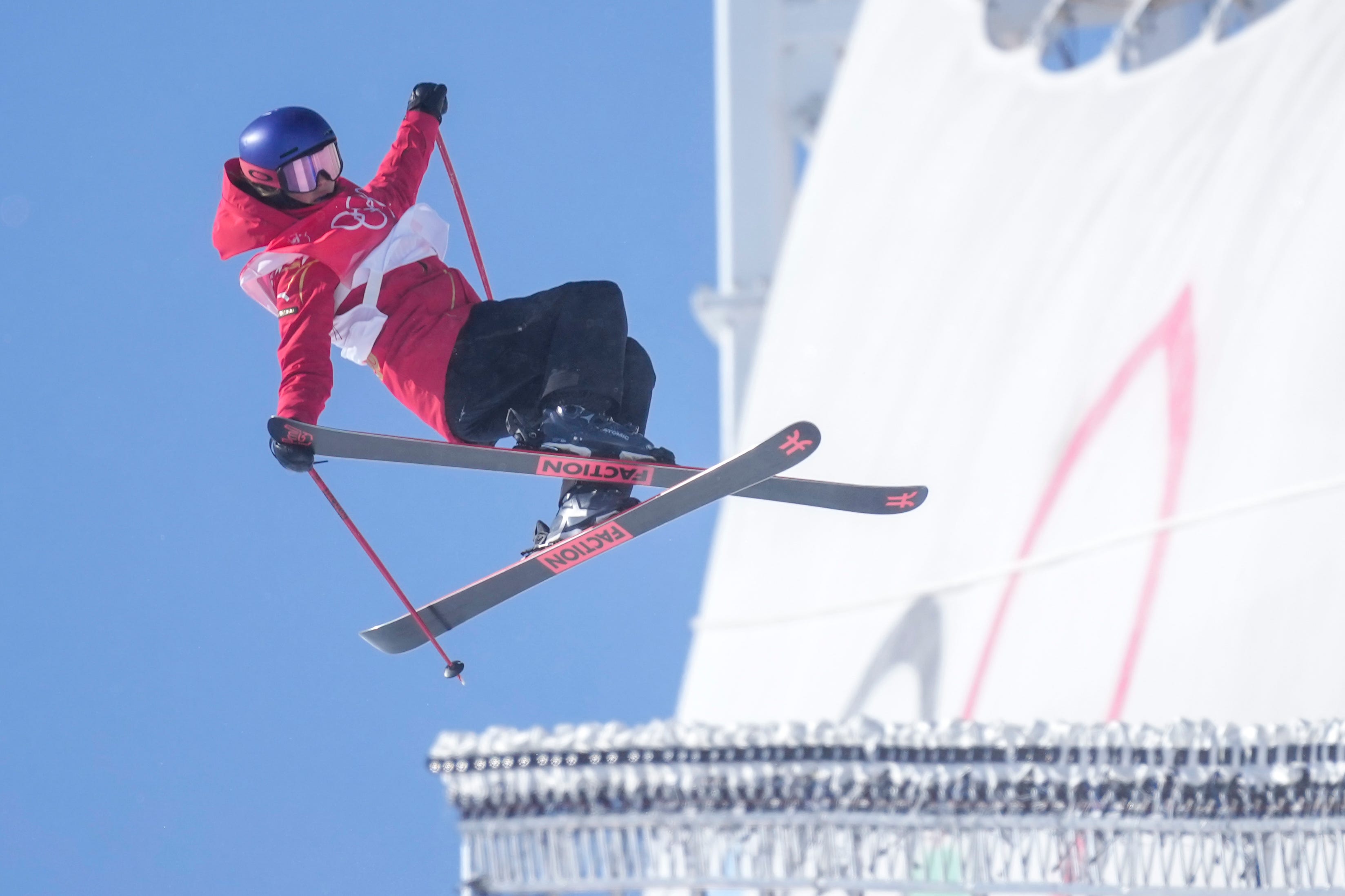 Eileen Gu wins gold in the ski halfpipe, her third Olympic medal.