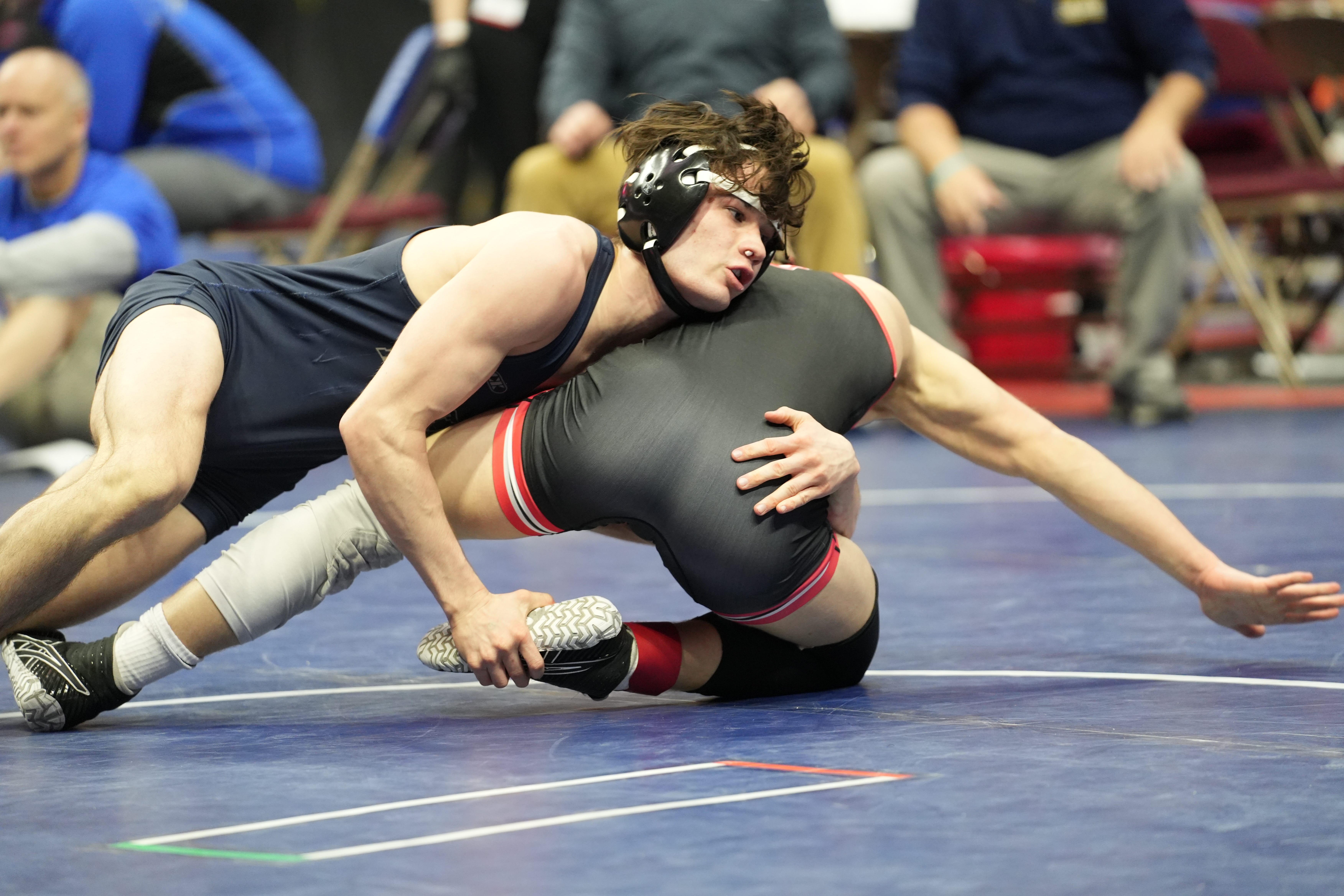 Notre Dame-West Burlington senior Blaine Frazier rolled to an 11-4 win over Jonathan Burnette of Spirit Lake in the Class 2A 132-pound semifinals Friday at Wells Fargo Arena in Des Moines.