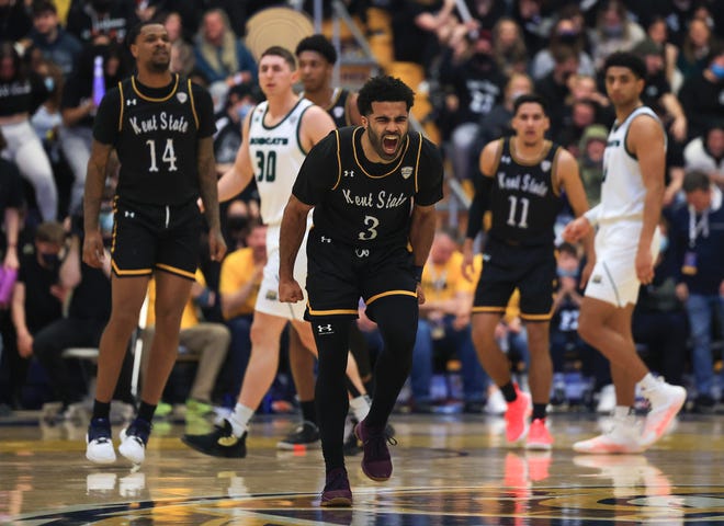 Kent State guard Sincere Carry celebrates after hitting a shot during last season's game against the Ohio University Bobcats at the M.A.C. Center.