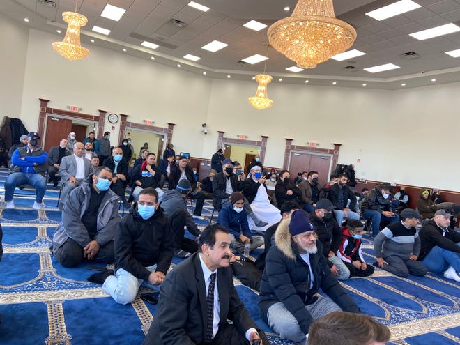 Congregants and others at Al-Huda Islamic Association, a Dearborn mosque on Warren Avenue, gather to hear FBI Detroit Special Agent in Charge, Dearborn Police Chief and Dearborn Mayor speak about the Feb. 12 fire at their mosque and fatal police shooting.