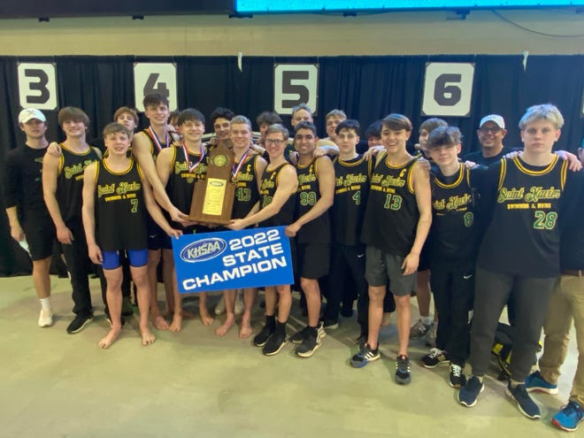 St. Xavier's swim and dive team celebrates winning its 34th straight state championship on Friday Feb. 18, 2022  at Lancaster Aquatic Center in Lexington