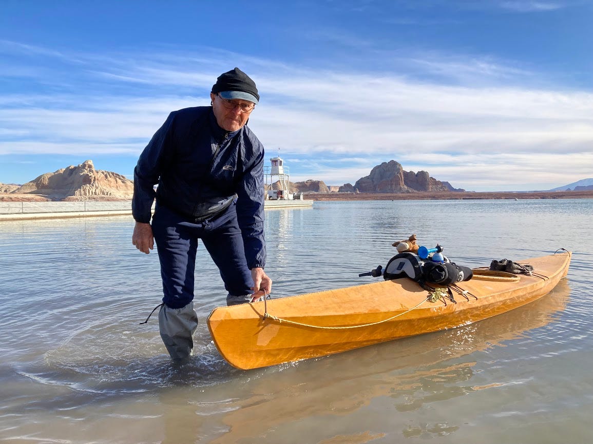 Tom Geiger, of Page, pulls his kayak ashore at the Stateline Auxiliary Ramp -- Lake Powell's only ramp currently open to motorized boats -- in early February. Although another ramp, at Antelope Point, remains an option for kayakers, he said, he avoids it because the rugged descent at from concrete to water is hard on his back.