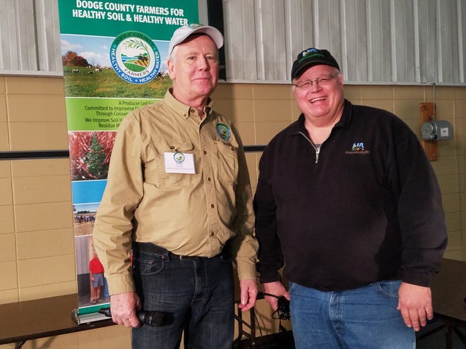 Gabe Brown, right, a North Dakota farmer who has adapted holistic agricultural practices visits with Tony Pierick, a Watertown farmer who is co-chair of the Dodge County Healthy Soil–Healthy Water group that hosted the Soil Health Expo in Juneau last week.