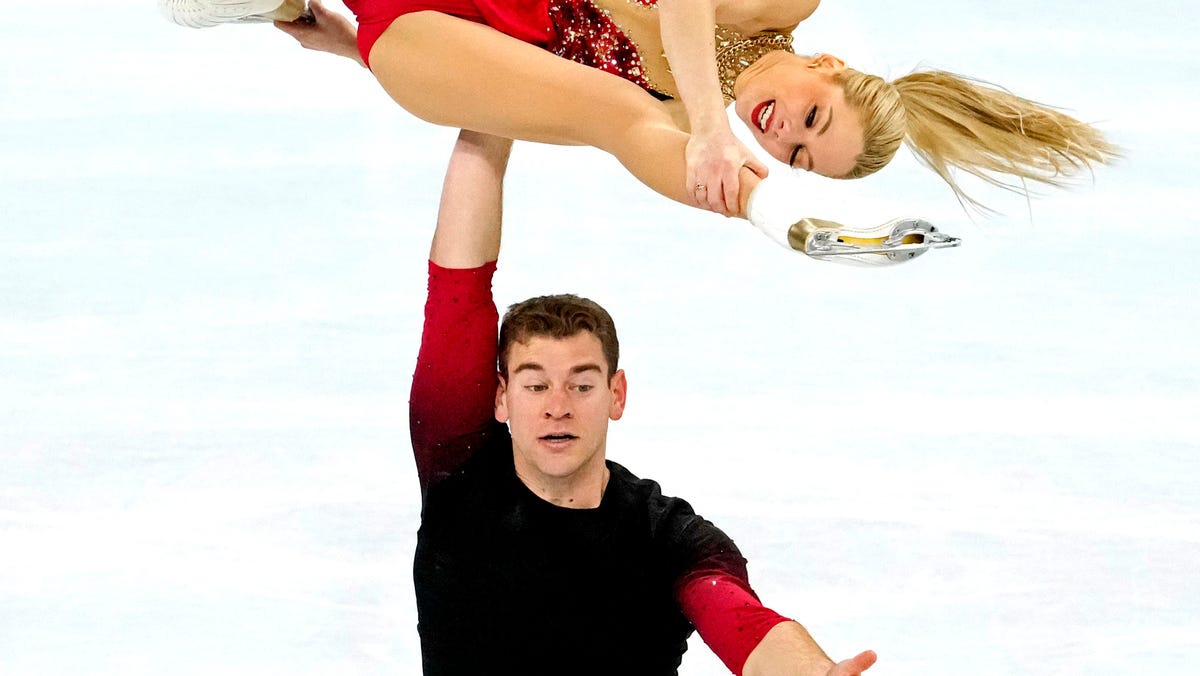 Alexa Knierim and Brandon Frazier compete in the team figure skating pairs short program event during the Beijing 2022 Olympic Winter Games at Capital Indoor Stadium.