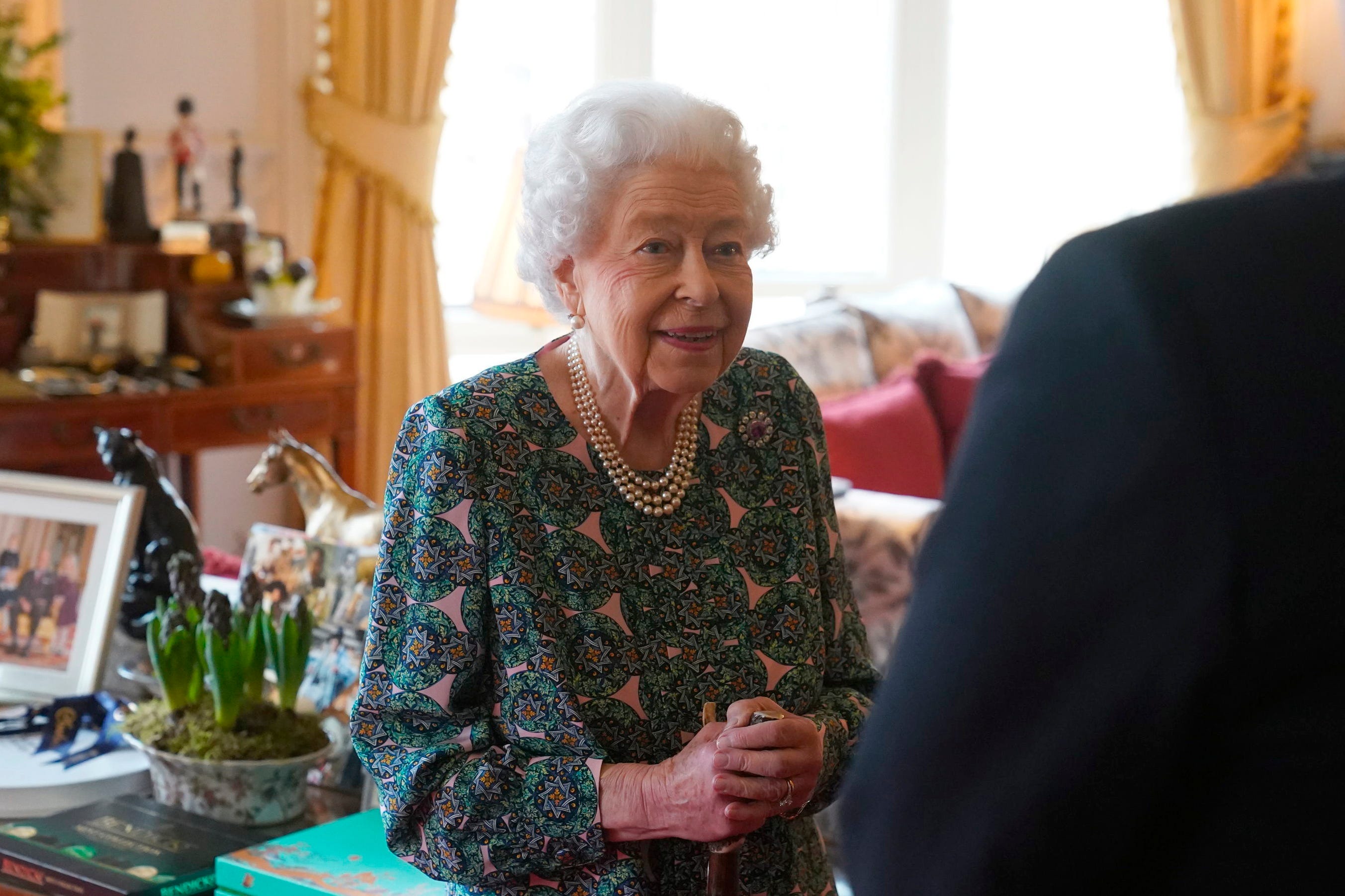 Queen Elizabeth II speaks during an audience at Windsor Castle where she met the incoming and outgoing Defence Service Secretaries, Wednesday Feb. 16, 2022. Buckingham Palace said Sunday, Feb. 20, 2022 that Queen Elizabeth II tested positive for COVID-19, has mild symptoms and will continue with duties.