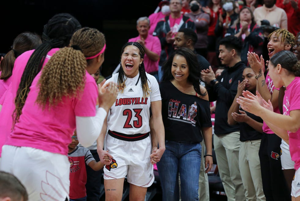U of L's Chelsie Hall (23) reacted as she was recognized during Senior Day festivities before their game against Virginia Tech at the Yum Center in Louisville, Ky. on Feb. 20, 2022.