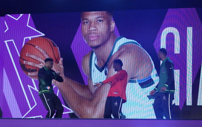 Team Antetokounmpo player Giannis Antetokounmpo (left) was introduced with his brothers during the 2022 NBA All-Star Saturday Night Skills Challenge at Rocket Mortgage Field House.
