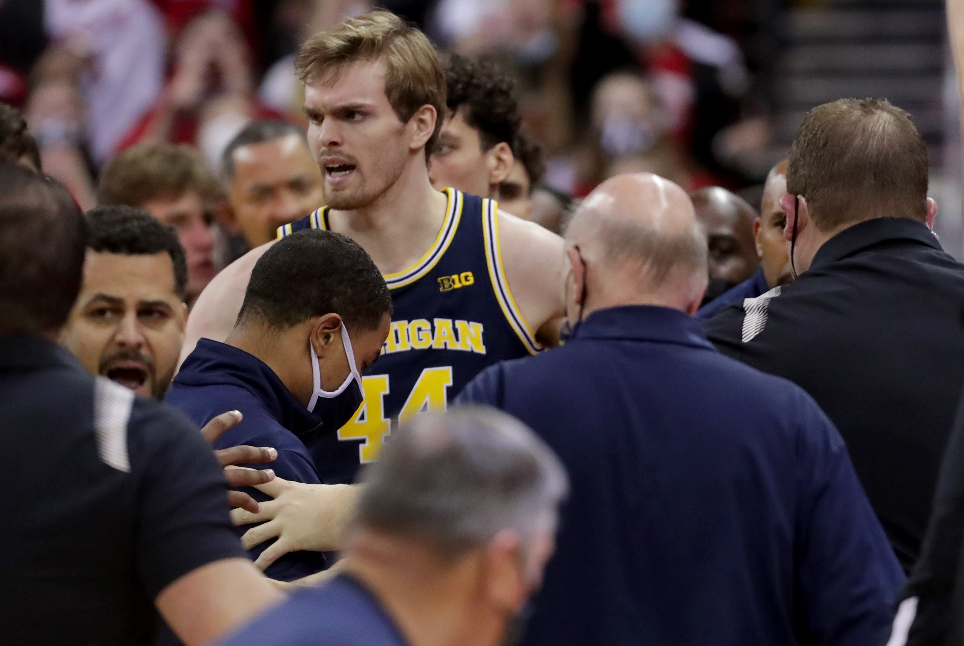 Juwan Howard strikes Wisconsin assistant after Michigan loss Juwan Howard strikes Wisconsin assistant after Michigan loss