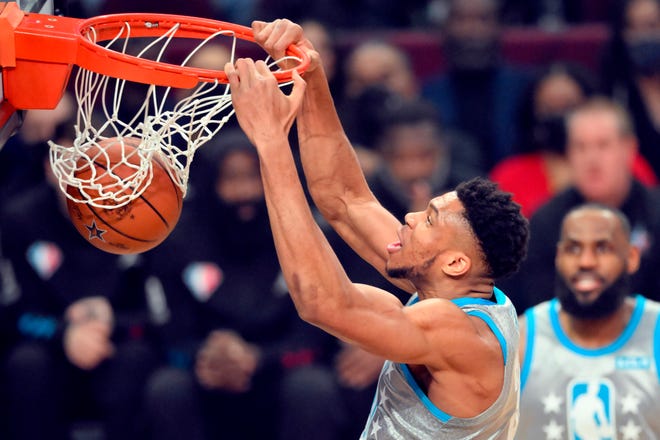 Giannis Antetokounmpo (34) dunks during the 2022 NBA All-Star Game, Feb. 20, 2022, in Cleveland.