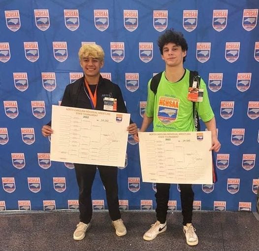 Uwharrie Charter's Aldo Hernandez and Grayson Roberts won individual state championships at the NCHSAA wrestling championships on Saturday, Feb. 19, 2022, in Greensboro.