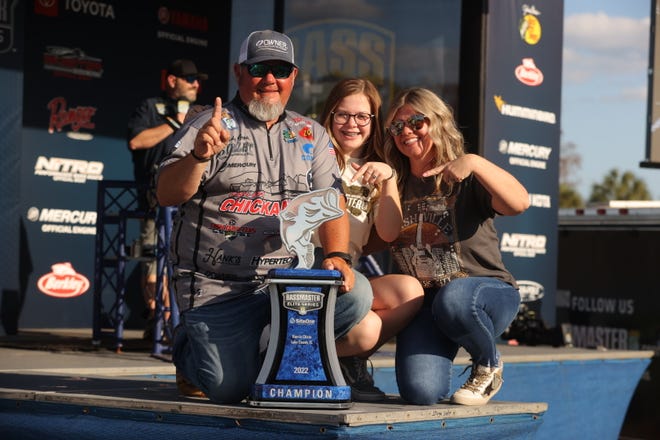 Buddy Gross from Chattanooga, Tennessee, posts with the Bassmaster Elite Series trophy after winning Sunday on the Harris Chain of Lakes. [COURTESY / SEIGO SAITO, BASS]