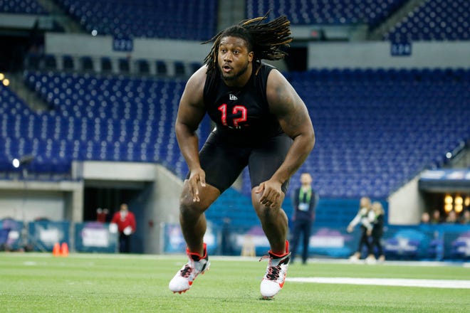 Ohio State defensive lineman Davon Hamilton (DL12) goes through a workout drill during the 2020 NFL Combine at Lucas Oil Stadium. The Jaguars drafted Hamilton in the third round. [Brian Spurlock-USA TODAY Sports]