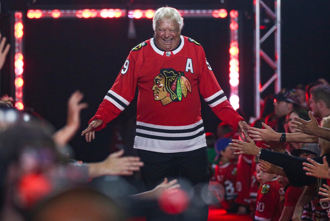 FILE - Former Chicago Blackhawks player Bobby Hull is introduced to fans during the NHL hockey team's convention in Chicago, Friday, July 26, 2019.