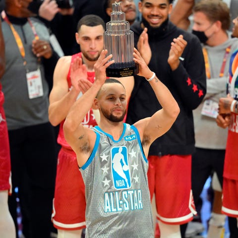 Steph Curry celebrates after winning All-Star MVP 
