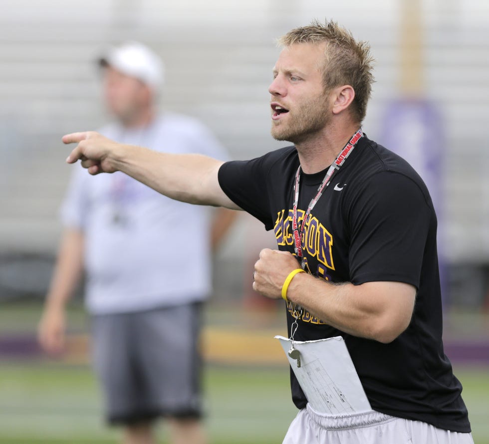 Jay Rohr coaches Jackson's linebackers during a 2015 football practice.