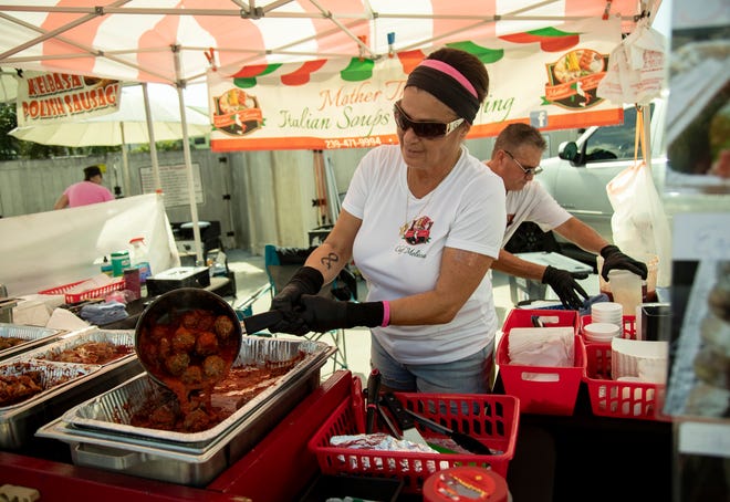 Melissa Best restocks some of her famous meatballs at her booth, Mother Theresa's Italian Soups & Catering, at the Cape Coral Farmer's Market on a recent Saturday.