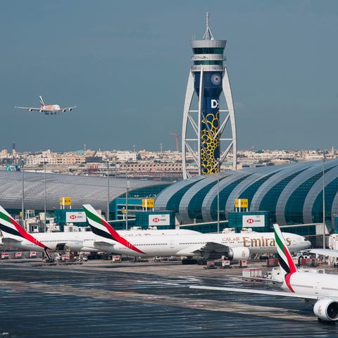 An Emirates jetliner comes in for landing at Dubai