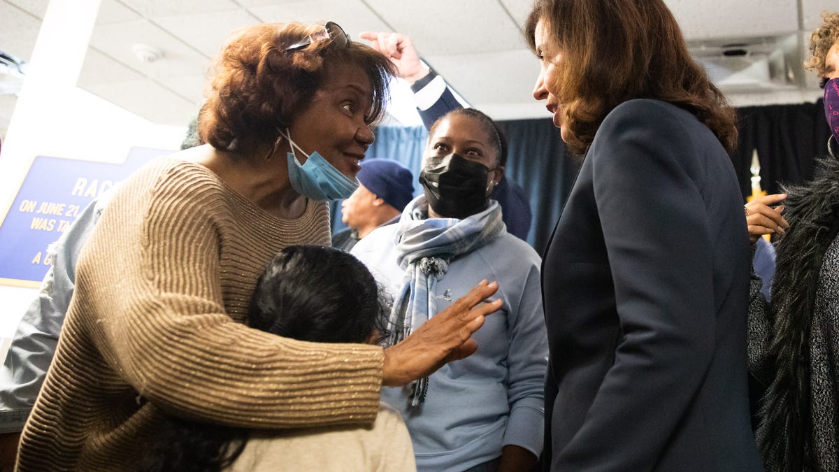 Dr Evelyn Lindsey, left, and her grandson Joaquin Flores, 4, talk to New York Gov. Kathy Hochul after a news conference in Newburgh, NY, on Wednesday, Feb. 23, 2022.