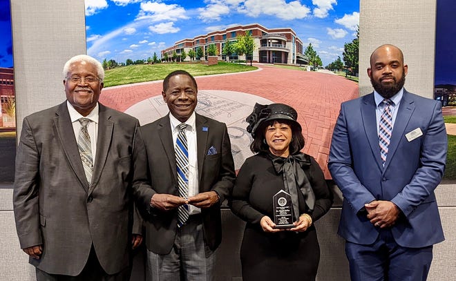 MTSU President Sidney A. McPhee, center left, and his wife, Elizabeth McPhee, center right, were presented special awards by the Murfreesboro Branch of the NAACP for their ongoing community service and support of underserved student populations at the university and Murfreesboro City Schools. The McPhees were presented the NAACP's President's Awards during a virtual Martin Luther King Jr. and Social Justice Celebration that was broadcast Monday, Feb. 21. NAACP first vice president, the Rev. Goldy Wade, far left, and NAACP Executive Committee member Aaron Treadwell, an MTSU assistant professor of history, presented the awards on behalf of current NAACP President Katie Wilson.