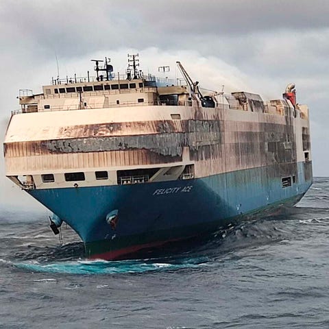 Smoke billows from the burning Felicity Ace car tr