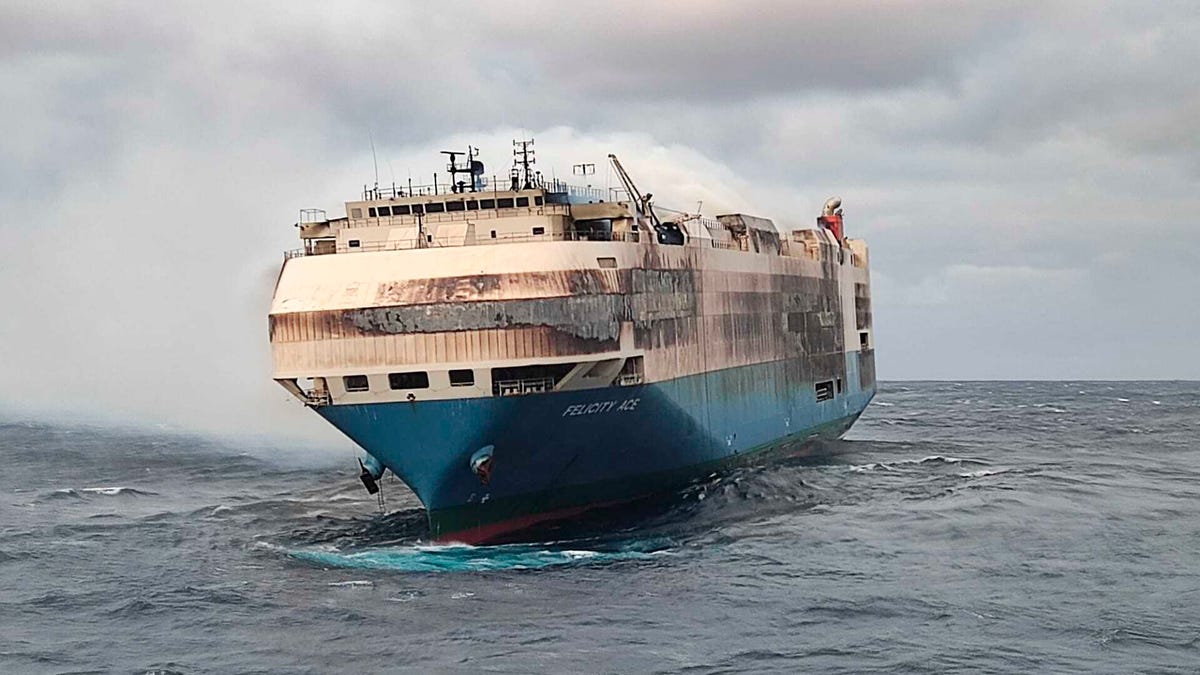 Smoke billows from the burning Felicity Ace car transport ship near the mid-Atlantic Portuguese Azores Islands. The ship's crew was taken by helicopter to Faial island about 100 miles away  Feb. 16. There were no reported injuries.