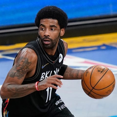Nets' guard Kyrie Irving hasn't played in a game i