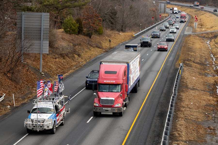 Bob Bolus, a businessman from the Scranton, Pa., area, drives his semitruck leading a "Freedom Convoy" on Interstate 81 southbound  on Feb. 23.