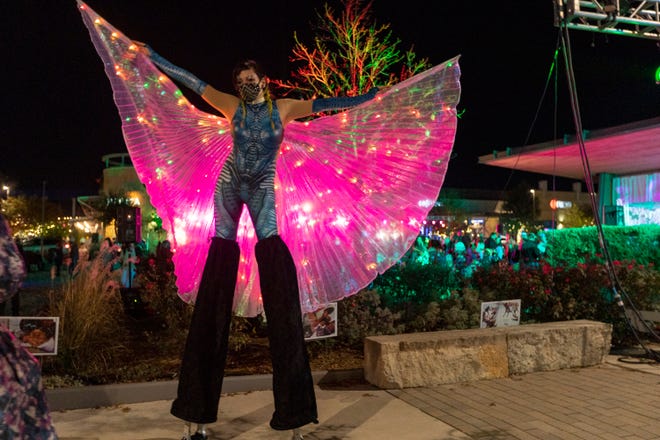Carla x Infekt poses for photos during the 2020 Bee Cave BuzzFest at the Hill Country Galleria. This year's event is March 3-5.