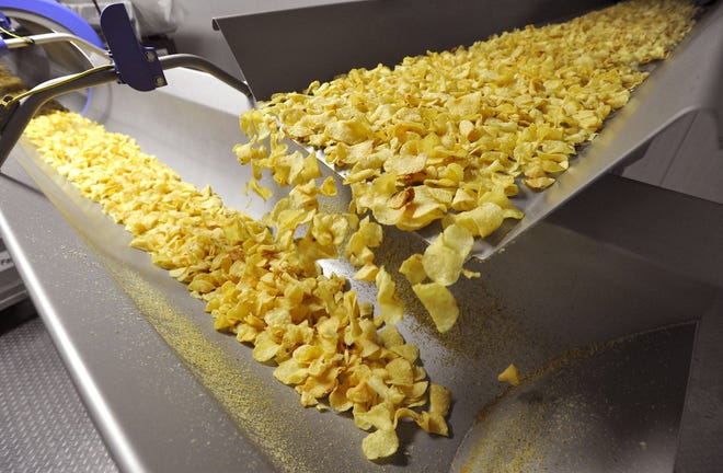 Potato chips are produced in this January 2018 file photo at what is now the Shearer's snack food plant in Waterford. The real estate has been sold, but business is expected to continue as usual.