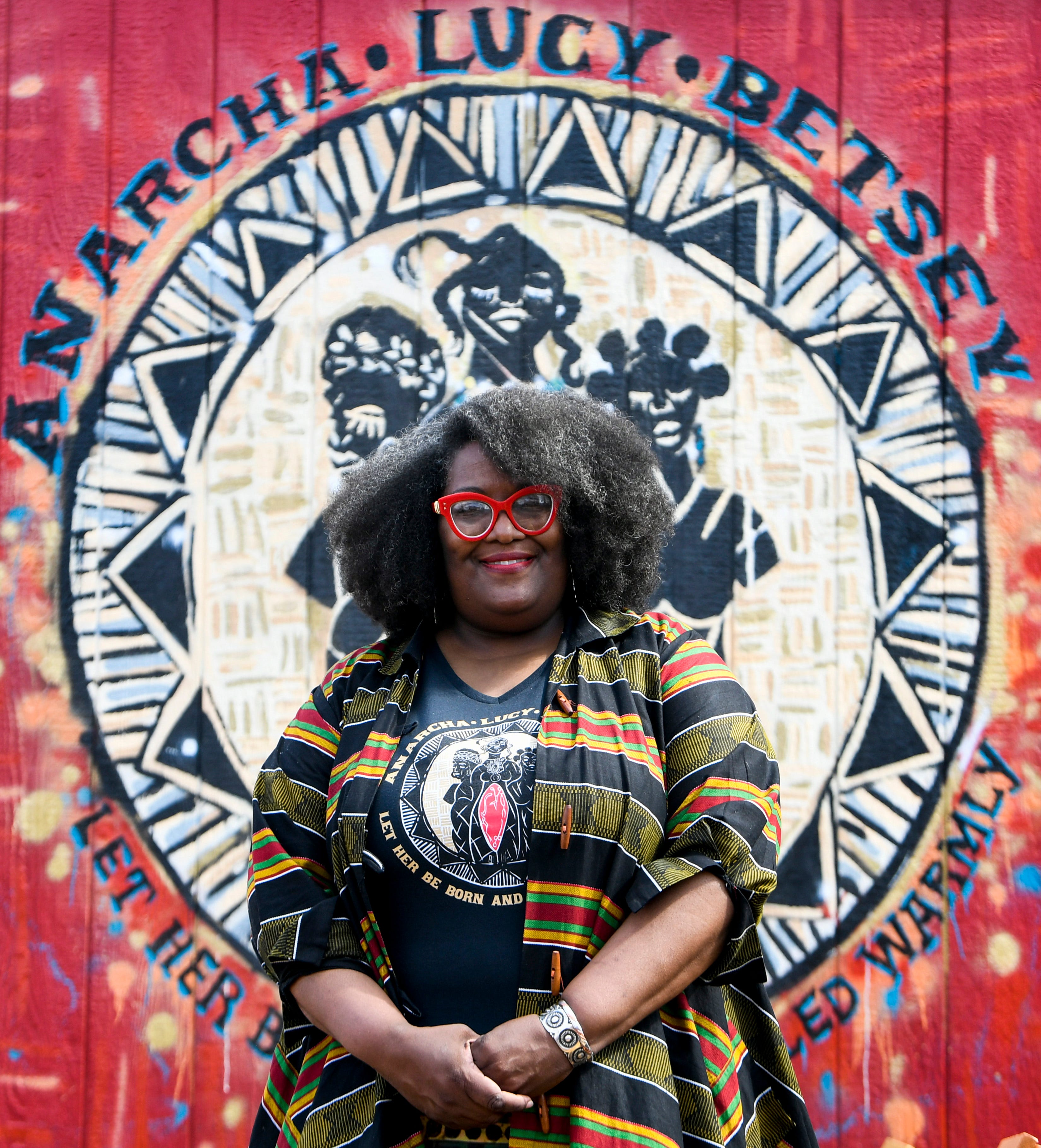 Michelle Browder poses in the Mothers of Gynecology Park on the More Up Campus in Montgomery, Ala.